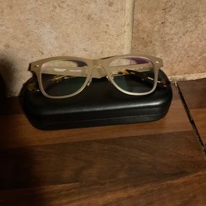 Stylish gold frame made by David ford . The frames handles are hand crafted.